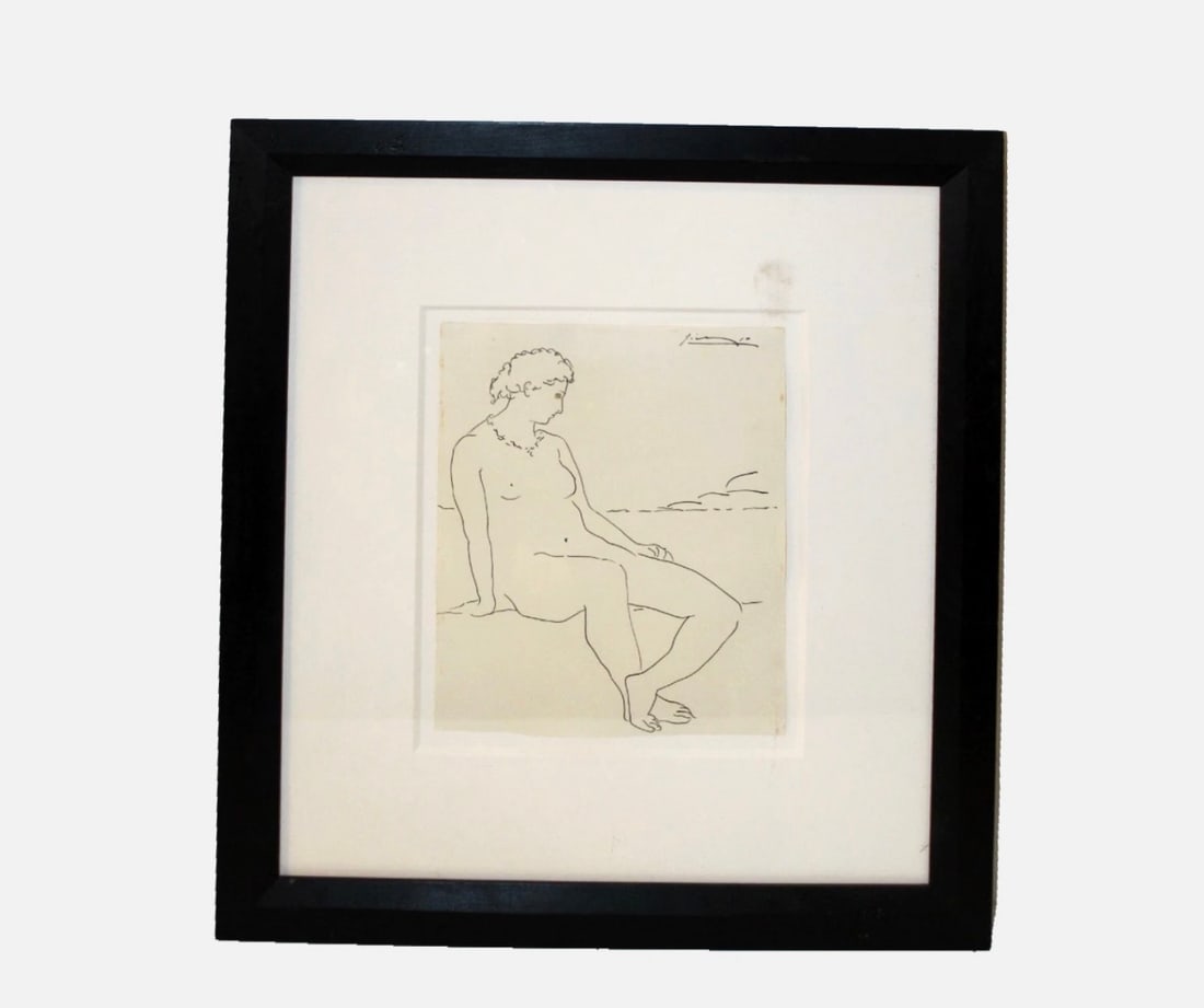 Signed Picasso Print of Seated Nude Woman: Unverified signature/print. Elegant abstract print of a nude woman. The paper itself has some staining on the edges, suggesting a unique history of the piece itself, possibly an original rather than