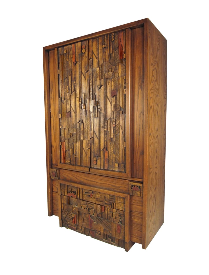 Mid-Century "Pueblo" Armoire by Lane: Stylish mid-century modern armoire manufactured by Lane. Intricate design throughout the piece's front. Ample storage space with adjustable shelving. // PICKUP LOCATION: Brooklyn, NY // Condition: Goo