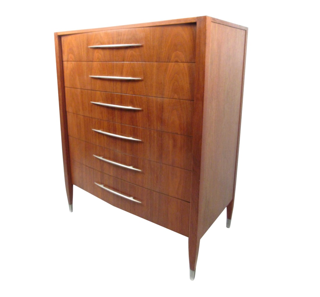 Vintage American Walnut Dresser with Chrome Accenting by Sligh Furniture: Vintage-modern high boy dresser by Sligh Furniture, features six drawers with unique chrome handles, and sculpted chrome capped feet. This well made case piece ensures plenty of room for storage