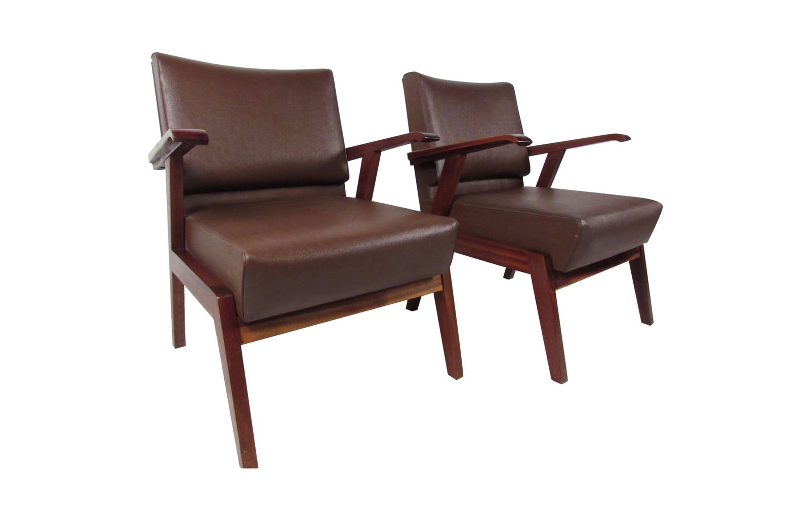 Pair of Unique Mid-Century Modern Italian Floating Armchairs: This comfortable pair of vintage Italian hardwood armchairs features a comfortable vinyl upholstered seat and backrest. Studded trim on back of seats, perfect pair for a variety of settings. Second pa