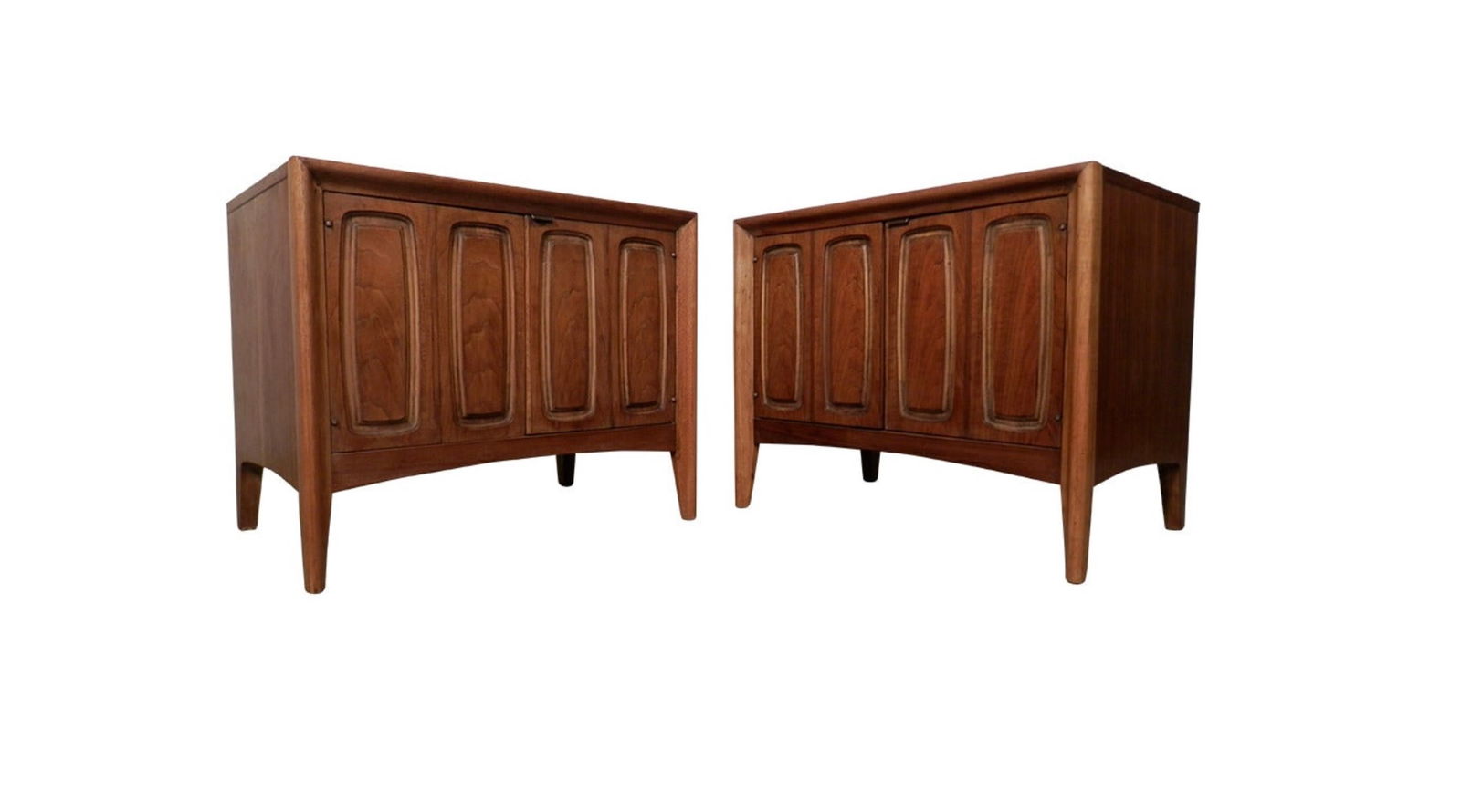Broyhill Premier 'Emphasis' Cabinet Nightstands: Attractive Mid-Century Modern nightstands with inside storage, made by Broyhill for their 'Empahsis' line. Features nice walnut grain with golden oak trim, carved relief pattern on doors and clean