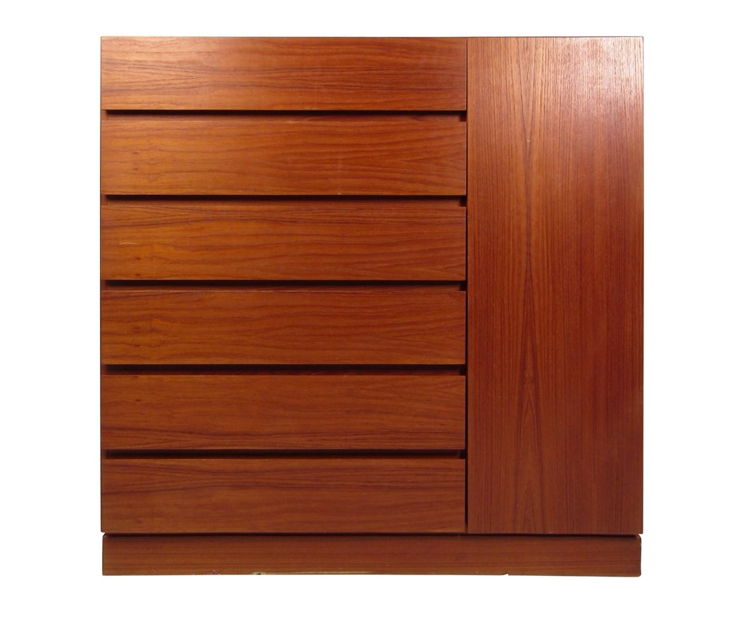 Midcentury Danish Teak Cabinet: Vintage modern dresser featured in teak veneer, has six wide drawers and six hidden drawers. // Pickup Location: Brooklyn, NY // Condition: Wear consistent with age and use. Veneer missing,