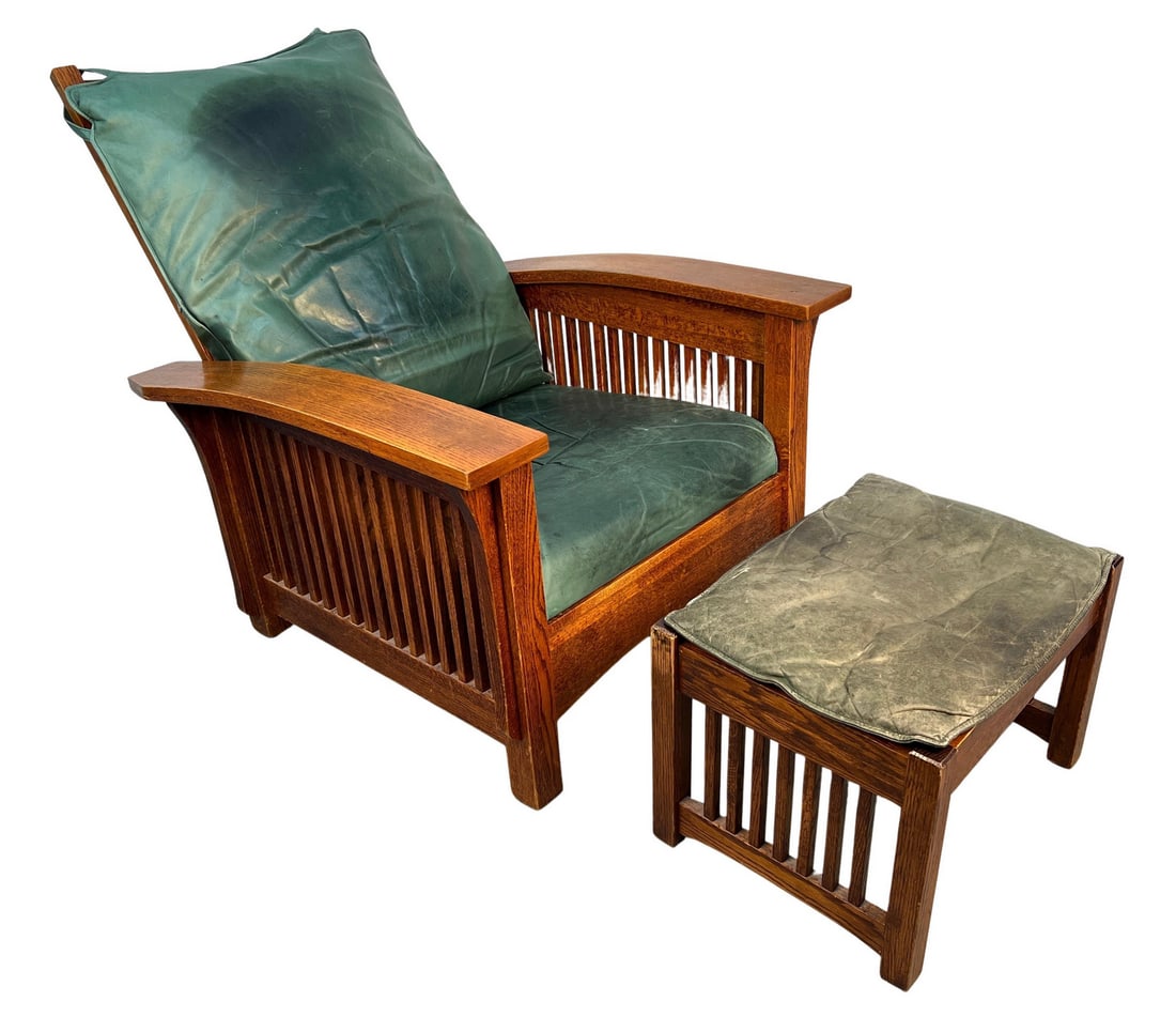 Mission Oak Lounge Chair with Ottoman: Beautiful Mission-style lounge chair and matching ottoman crafted by Stickley Furniture. Features solid oak construction with classic slat detailing and rich green leather cushions. A perfect blend