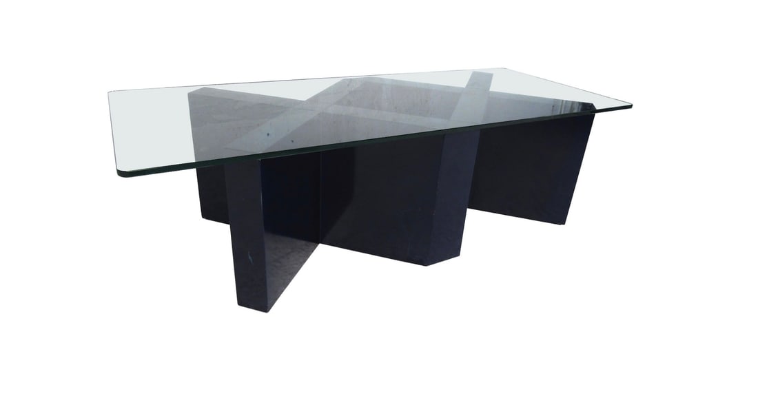 Midcentury Designer Wood and Glass Coffee Table: This incredibly unique coffee table features a wood base with a thick glass top. Perfect for any modern living room or TV room. This piece is sure to strike a conversation every time someone sees it.
