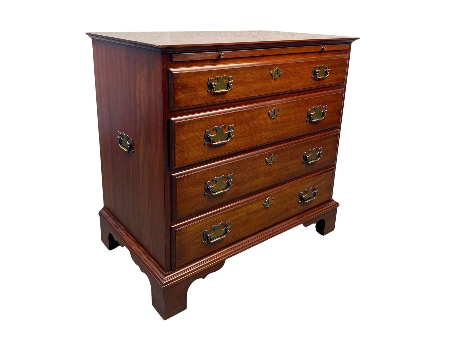 Chest of Drawers by Pennsylvania House: Charming dresser crafted in rich walnut, showcasing a streamlined form and warm natural grain. Compact yet functional, it offers versatile storage and a refined presence, making it a great addition