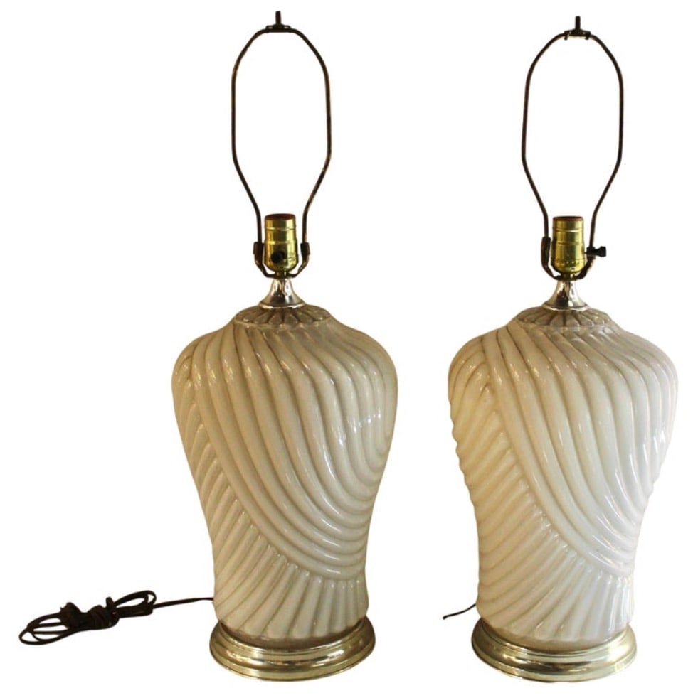 1980 Ceramic Drape Lamps: Pair of off white colored ceramic table lamps with draped style swirls. // PICKUP LOCATION: Brooklyn, NY // Condition: Good. Fading, scratches, re-wiring required. // Dimensions: Depth: