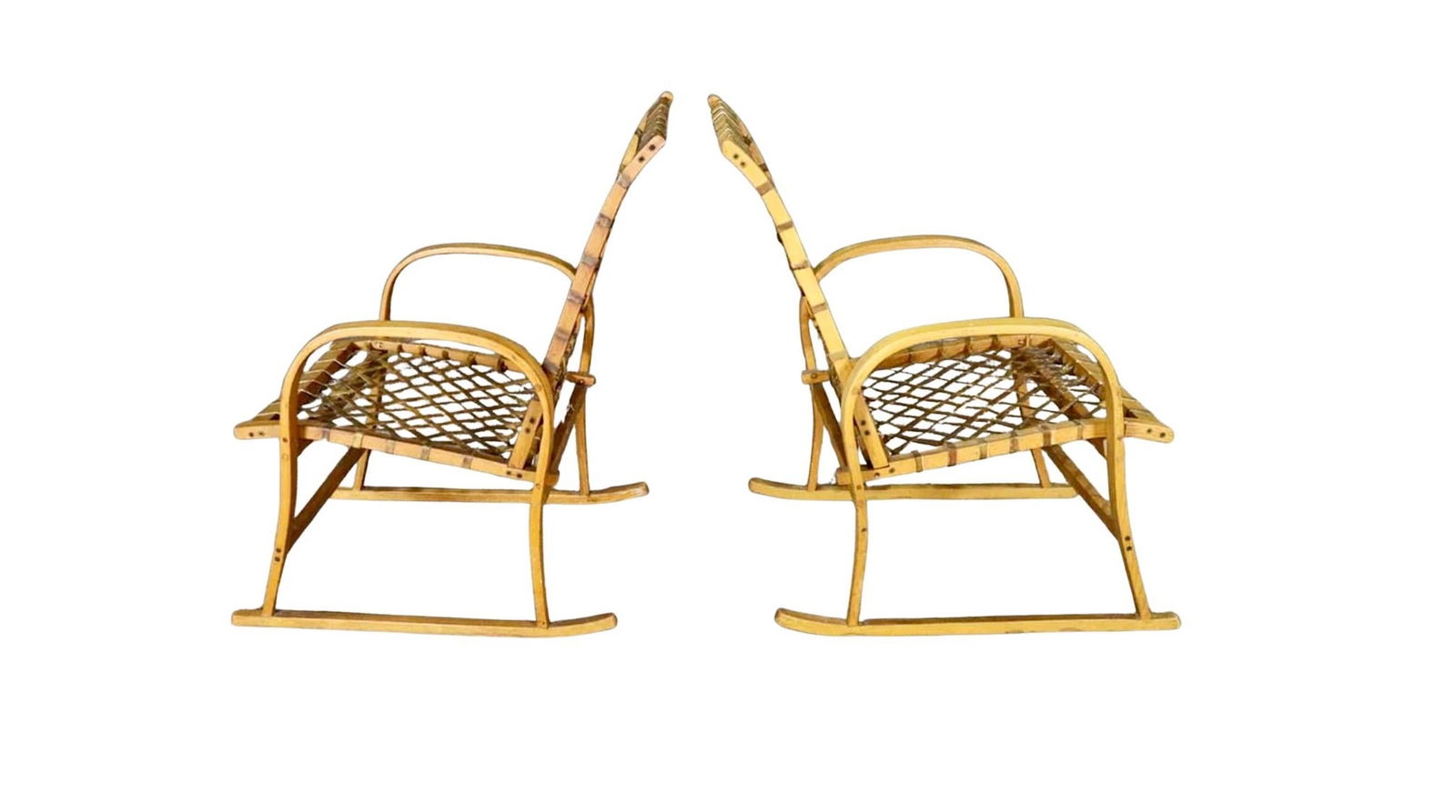 Handmade Snowshoe Armchairs: Pair of rustic armchairs handmade with bentwood maple and rawhide straps. This snowshoe style is perfect as an accent chair or country deck. // PICKUP LOCATION: Brooklyn, NY // Condition: