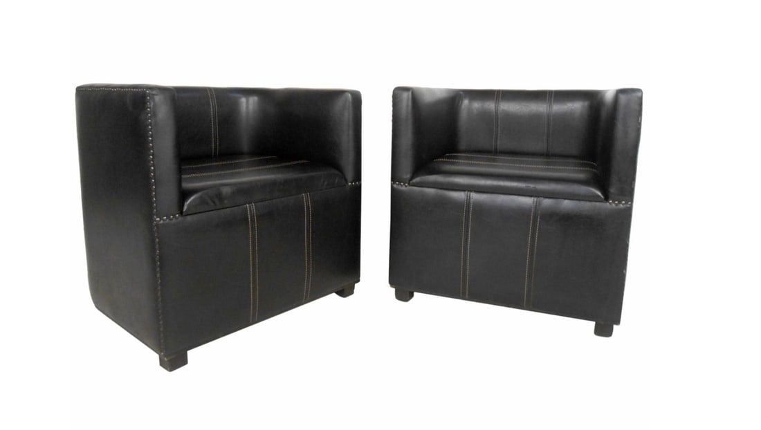 Pair of Mid-Century Modern Style Leather Club Chairs: This pair of leather club chairs features a unique squared shape with studded upholstery makes for a wonderful combination of style and comfort. // PICKUP LOCATION: BROOKLYN, NY // Condition: