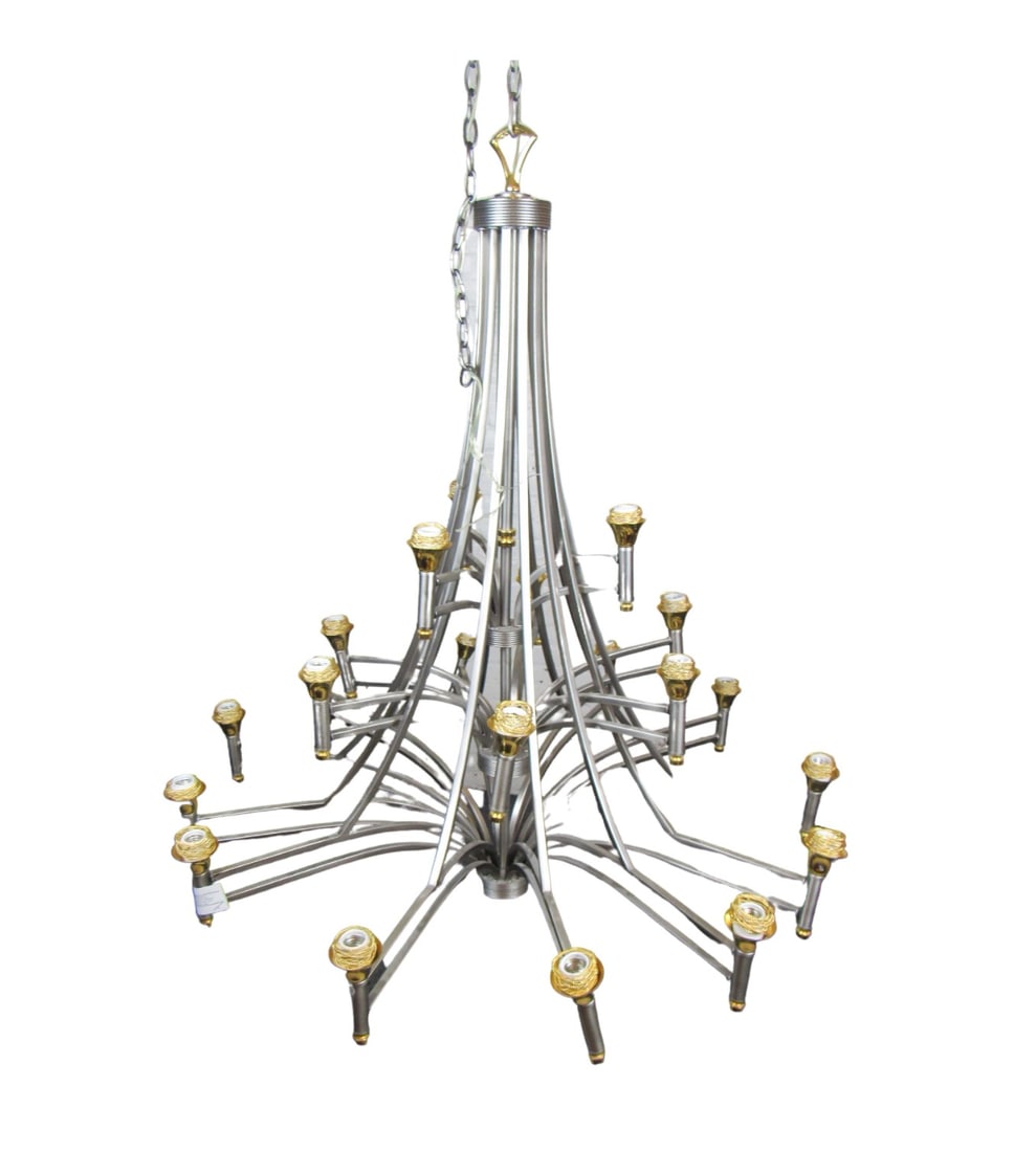 Massive Vintage Metal Chandelier: This elaborate and large chandelier features three tiers of metal supports for a unique look. This vintage piece can serve as the stylish focal point of a room while providing abundant lighting. //