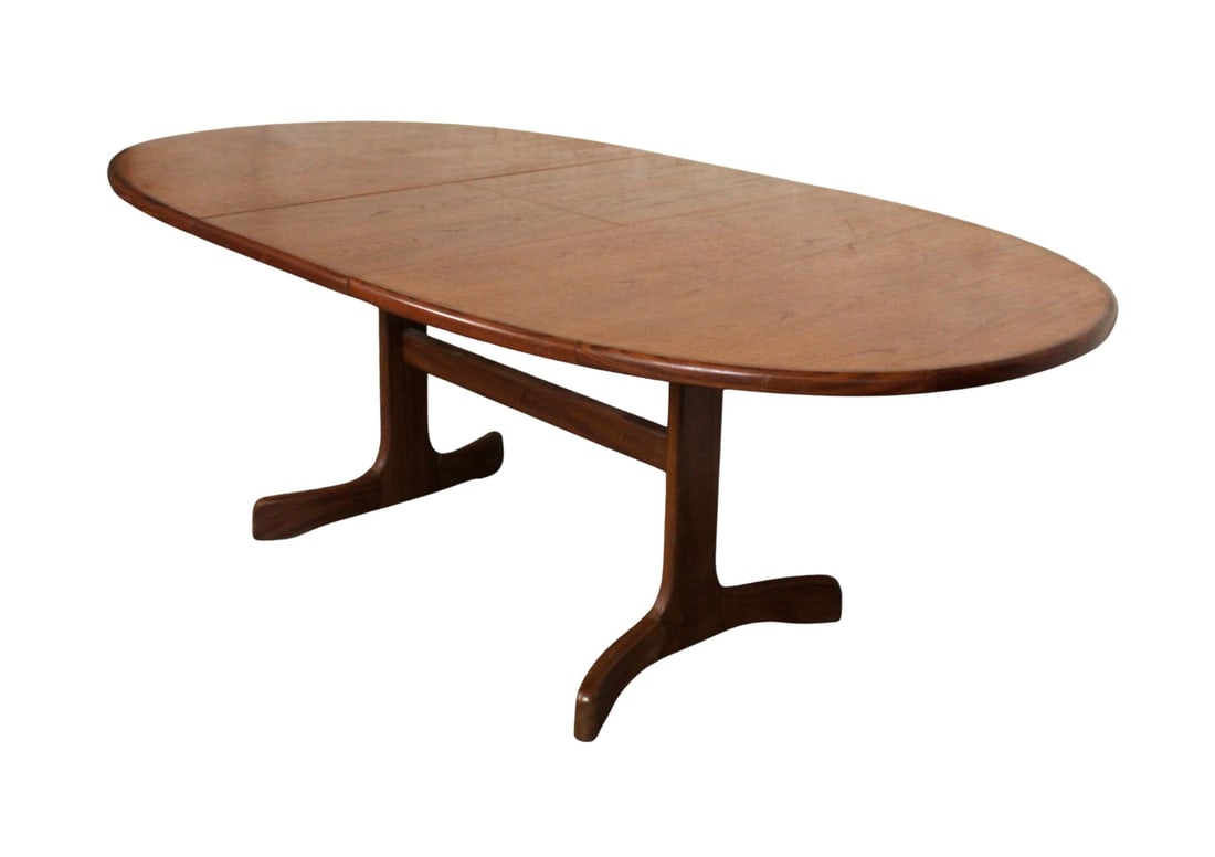 G-Plan "Whale Tail" Butterfly Leaf Dining Table: A striking Mid-Century Modern dining table by G-Plan, known as the iconic “Whale Tail” model. Crafted in richly grained teak, the table features sculptural tapering legs and a distinctive butt