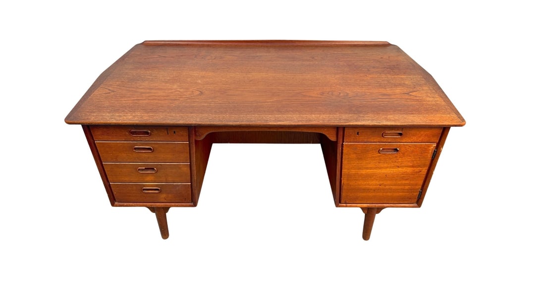 Mid-Century Modern Danish Walnut Desk by Svend Åge Madsen: Elegant mid-century modern Danish desk crafted by Svend Åge Madsen from beautifully grained teak. Features clean Scandinavian lines, multiple drawers for storage, and fully functional locks with the