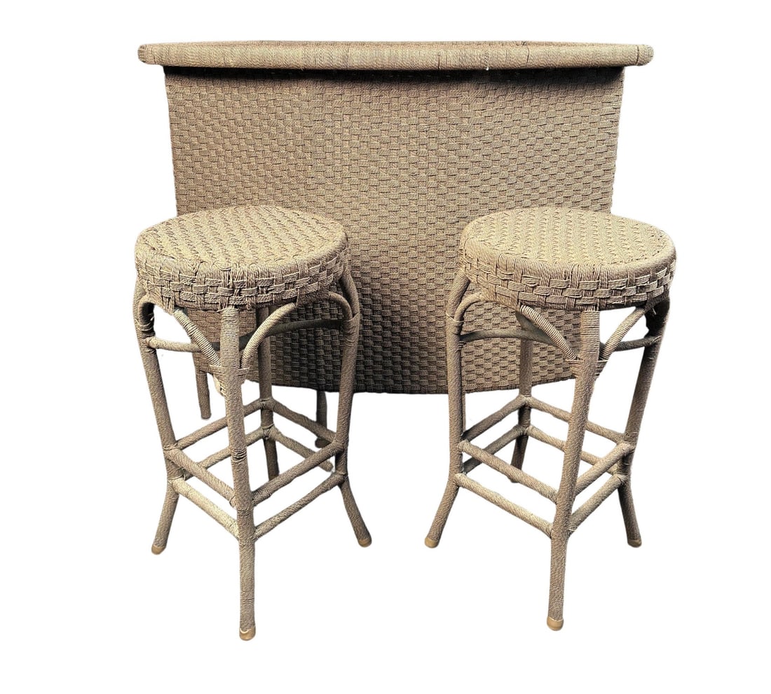 Woven Outdoor Bar Set: Modern Woven Outdoor Bar Set. Featuring a faux wicker weave throughout, (2) stools, and shelving for storage. Bar 50x23x45.5 Stools 16x16x30.5 // PICKUP LOCATION: WALL, NJ // Condition: Good.