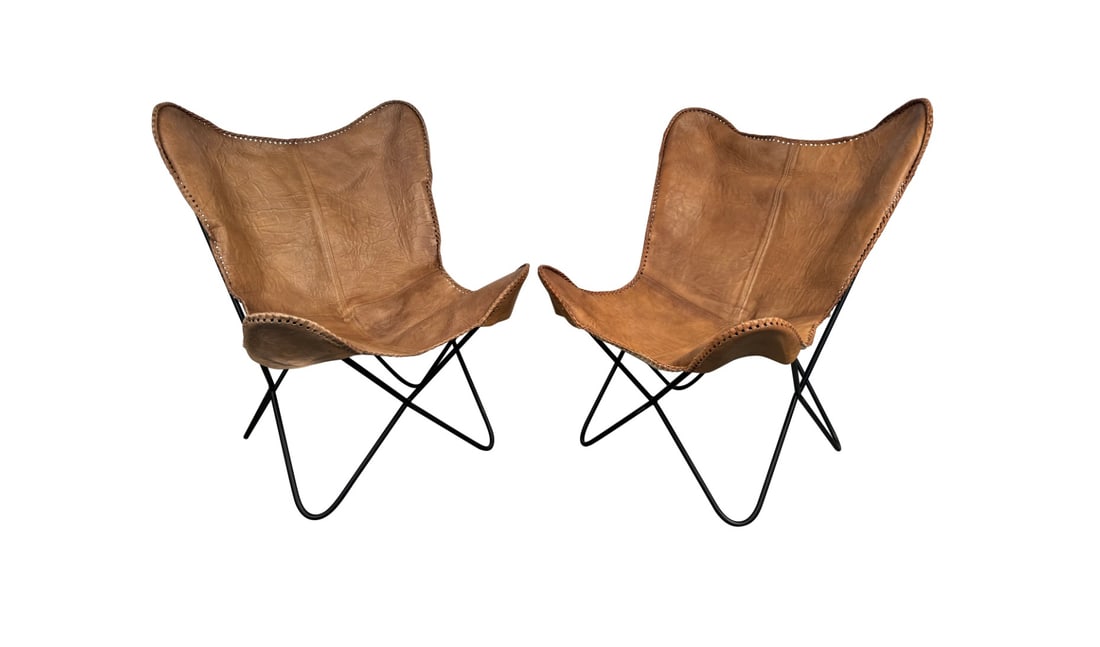 Vintage Style Leather Butterfly Chairs: Transform your living space with our stunning Vintage Style Leather Butterfly Chairs, where classic design meets modern comfort. Inspired by the iconic mid-century style, these chairs offer a perfect