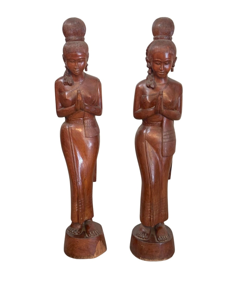Carved Teak Wood Sawasdee Women: Pair of three foot tall sculpted teak woman greeter. Both women in a praying pose with traditional wardrobe. Made of teak, and can be used outdoors. // PICKUP LOCATION: BROOKLYN, NY // 