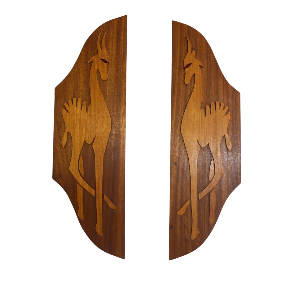 Pair of Wood Carved Wall Art: Pair of Gazelle wood art for mounting. This pair is nicely book matched and features a raised wood animal with red acrylic eyes. // PICKUP LOCATION: BROOKLYN, NY // Condition: Good. Wear