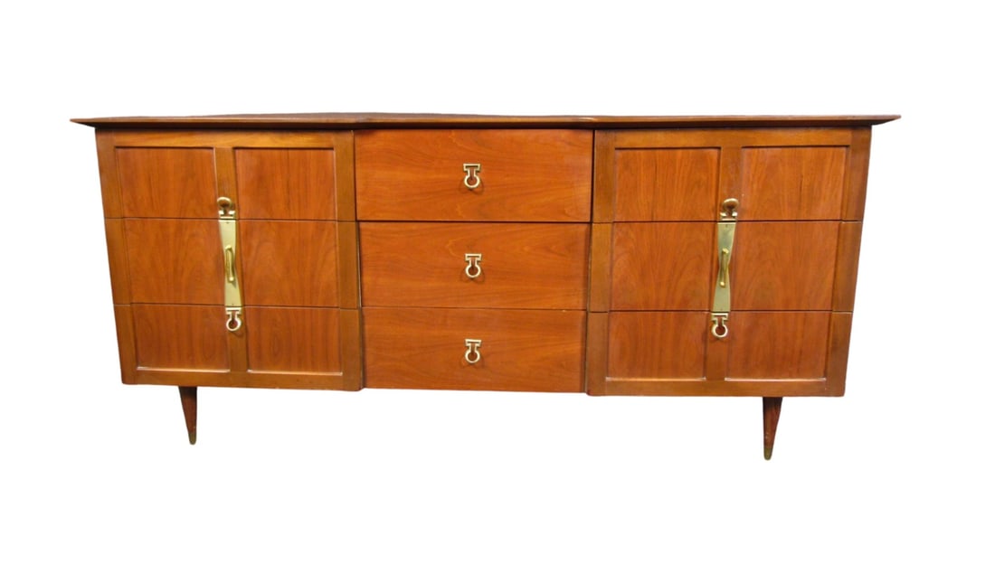 Mid-Century Modern Walnut Dresser: Gorgeous walnut dresser. Classic century design with unique brass handles. Complete with 9 drawers. // PICKUP LOCATION: WALL, NJ // Condition: Good. Wear consistent with age and use. Minor fading. Min