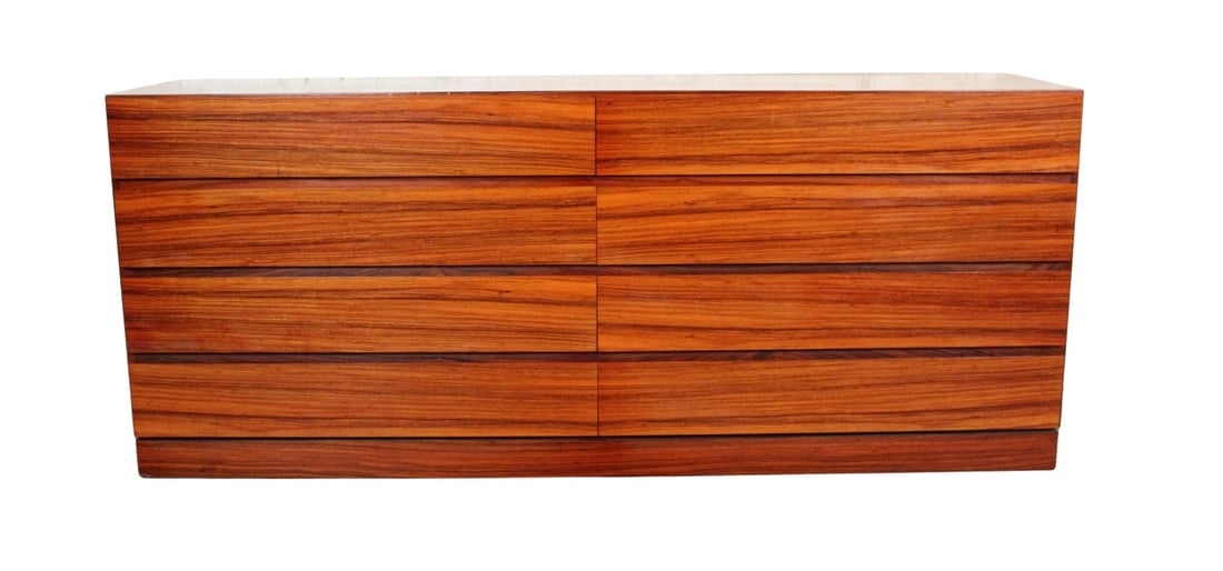 Mid-Century Modern Rosewood Dresser by Vinde Mobelfabrik: Elegant mid-century modern lowboy dresser crafted from rich rosewood by Danish maker Vinde Mobelfabrik. Featuring eight spacious drawers with sleek, minimalist handles, this piece showcases