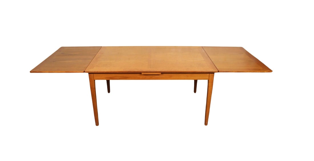 Vintage Skovby Mobelfabrik Teak Draw Leaf Table: A finely crafted Danish mid-century modern dining table by Skovby Møbelfabrik, featuring the distinctive "Kontrol" butterfly extension mechanism. Made from rich, golden teak, this table exemplifies