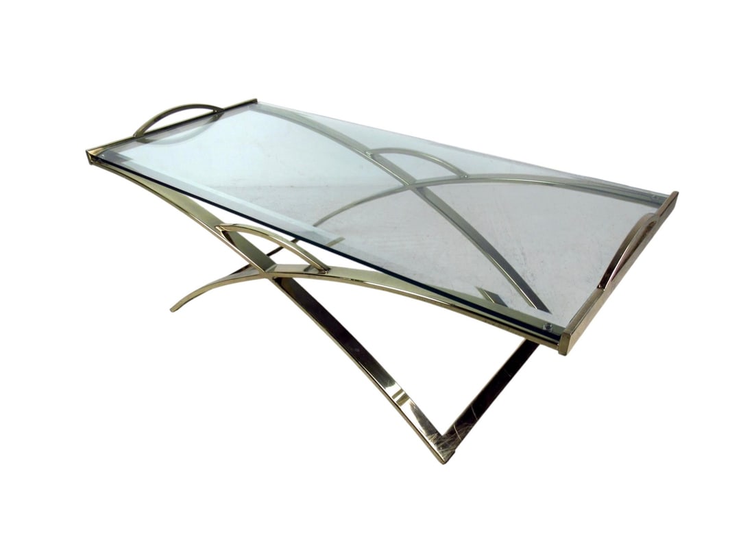 Mid-Century Modern Brass-Plated Coffee Table with Bevelled Glass Top: This midcentury coffee table features a unique design with a beautiful brass plated finish and bevelled glass top which offer a sleek modern flare to any home or office space. // PICKUP LOCATION: