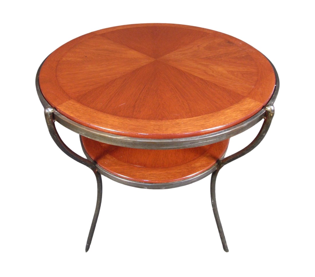 Vintage Mahogany Table: This vintage table combines a two-tiered design with rich mahogany and contrasting woodgrain patterns on its surface. An iron frame complements the wood and makes this table eye-catching and unique. 