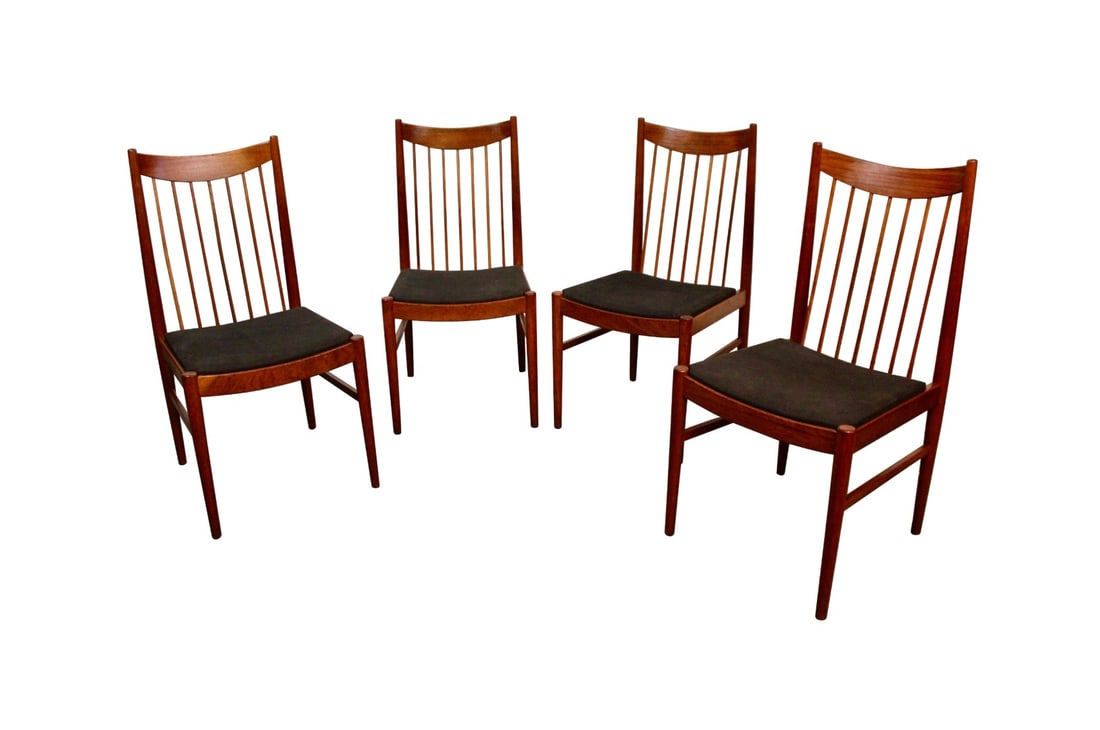 Mid-Century Teak Spindle Chairs by Arne Vodder for Sibast Denmark: Embrace the exquisite craftsmanship of genuine mid-century Danish modern design with this quartet of teak dining chairs designed by Arne Vodder and produced by Sibast Furniture. With solid teak