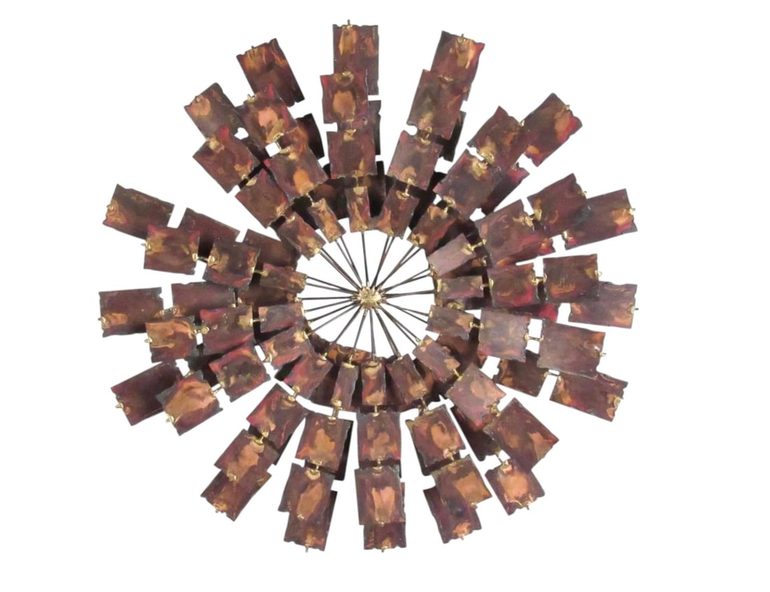 Mid-Century Curtis Jere Style Brutalist Metal Sunburst Art: This stylish sunburst style wall art features hammered metal in a circular design after the Mid-Century style of Curtis Jere. Unique mixed metal construction adds to the vintage modern appeal of the p