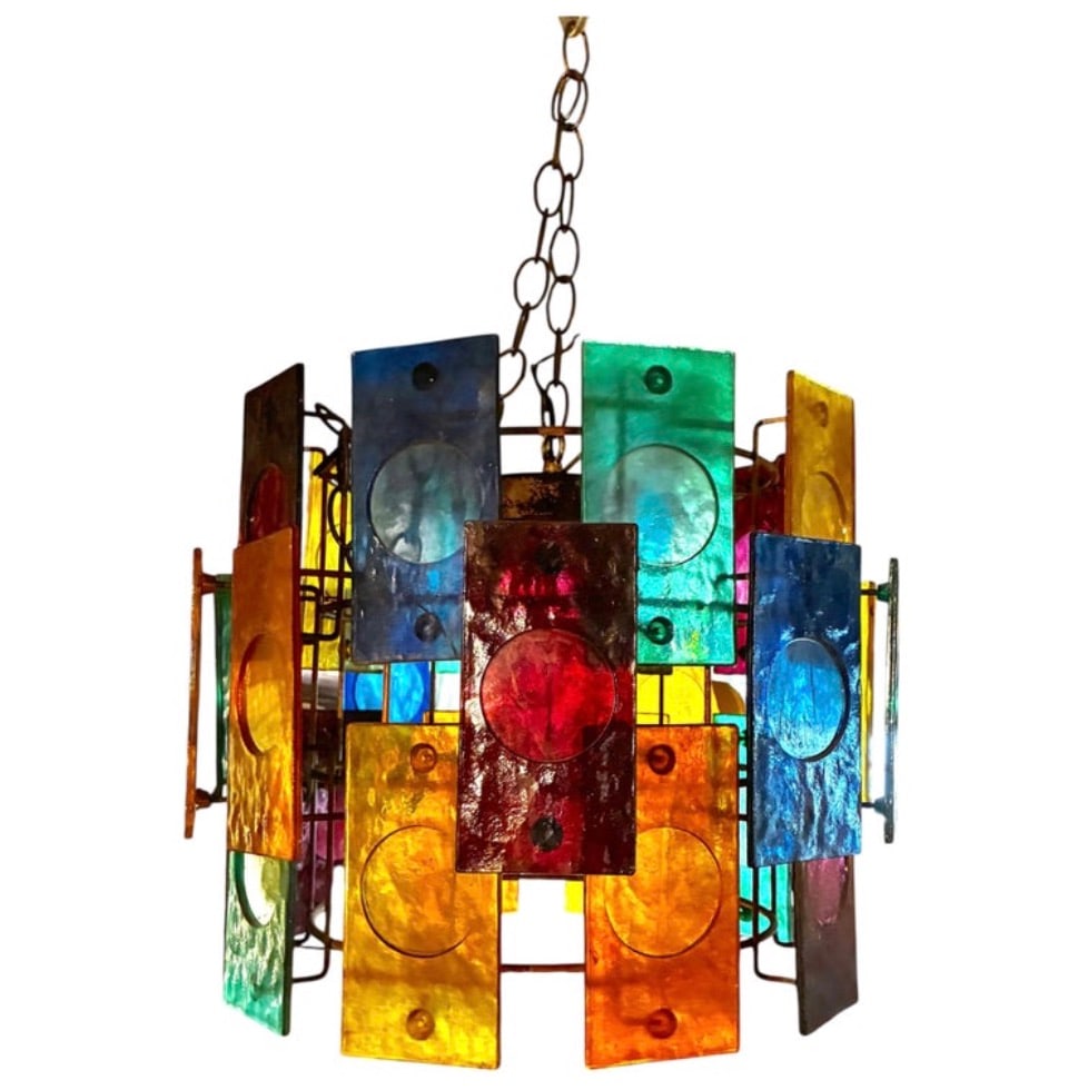 Mid-Century Hanging Chandelier w/ Multi-Color Acrylic Panels: Round swag pendant chandelier from the 1960s with bright colored panels that act as a shade for the single bulb socket. Offers a colorful addition whether lit or not. // PICKUP LOCATION: