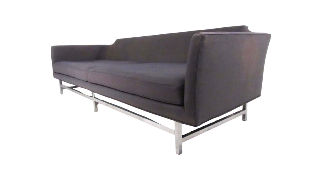 8 Foot Chrome Base Sofa: This oversized contemporary modern sofa features Mid-Century style design with unique cutaway back and spacious upholstered seating area. Wonderfully comfortable and long sofa perfect for any seating
