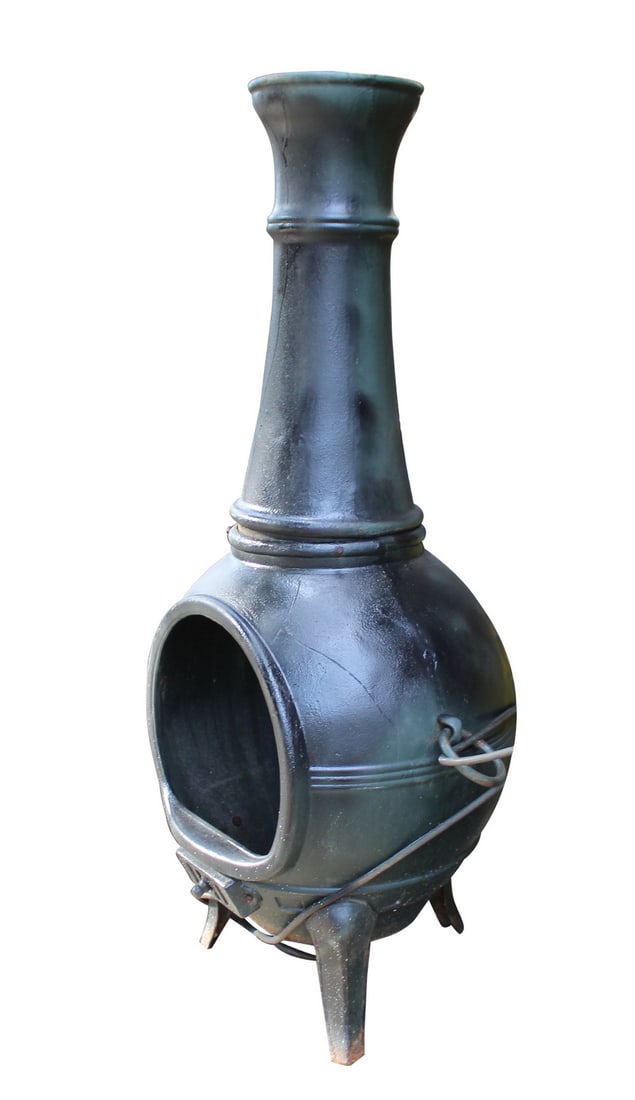 Cast Iron Chiminea / Stove: This cast iron chiminea features a wonderful old fashioned design. Two pieces with flared legs.This piece would make a perfect center piece to any outdoor lounge area. // PICK UP LOCATION: BROOKLYN NY