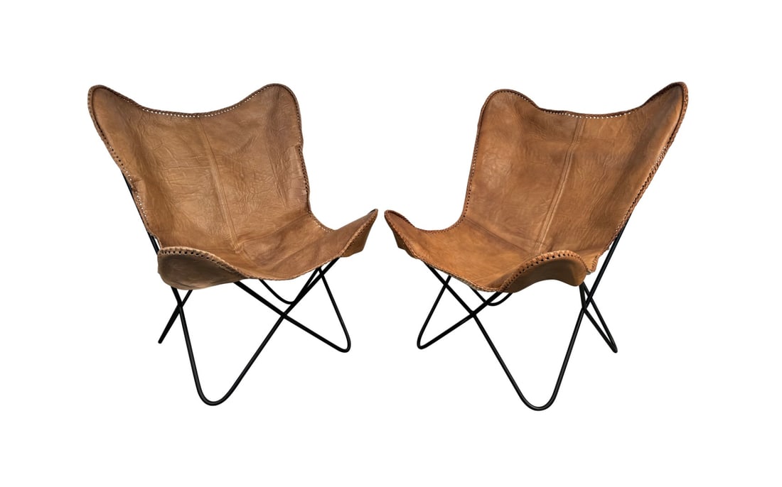 Vintage Style Leather Butterfly Chairs: Transform your living space with our stunning Vintage Style Leather Butterfly Chairs, where classic design meets modern comfort. Inspired by the iconic mid-century style, these chairs offer a perfect