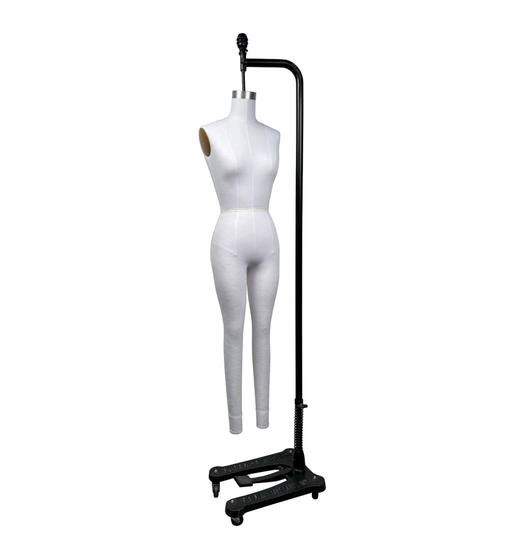 Mid-Century Dress Form by Superior Model Form Inc.: Step back into the golden age of fashion with this authentic mid-century dress form by Superior Model Forms Inc., a striking blend of functional design and sculptural beauty. Once used in tailoring