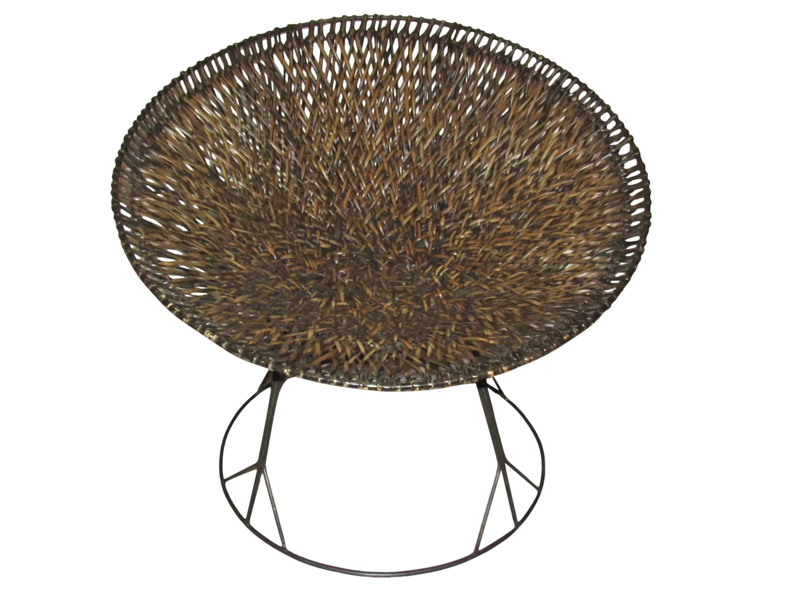 Round Wicker Chair: Vintage wicker chair. Iron base is stable. // PICKUP LOCATION: BROOKLYN, NY // Condition: Good. Wear consistent with age and use. Some darkening of wicker that is appropriate for the item's age. //