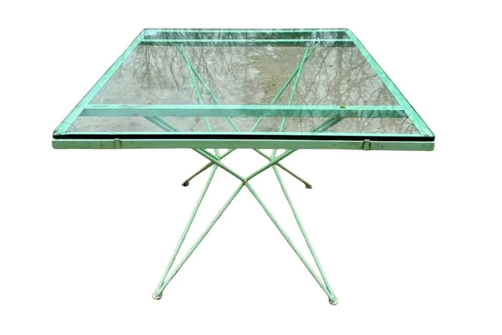 Outdoor Iron Dining Table: Mid-century modern iron table with glass top. Angled legs under square top. // Pickup location: Wall, NJ // Dimensions: Width: 36 in. Depth: 56 in. Height: 29 in. // Condition: Age-appropriate wear,