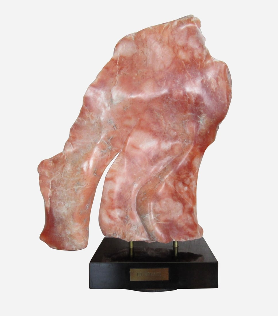 Ed Stertz Salmon Marble Table Sculpture: An interesting stone sculpture that is mounted to a swiveling base. The marble's unique form and naturally salmon pink color make for an eye-catching decoration in any room. // PICKUP LOCATION: BROOKL