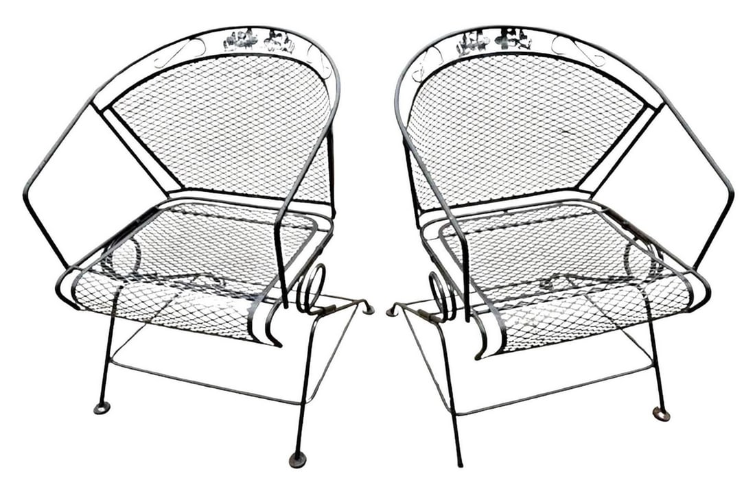 Pair of Iron Garden Spring Chairs: Pair of vintage iron patio chairs featuring spring-based rocking action for added comfort and relaxation. Designed with sturdy frames and classic lines, these chairs combine functionality with timeles