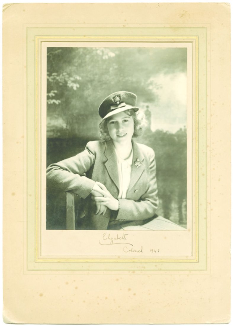 ELIZABETH II, QUEEN SP A wonderful black and white: ELIZABETH II, QUEEN SP A wonderful black and white Cecil Beaton photograph of Princess Elizabeth, image size 23x18cm, signed on the mount below the image by the princess, "Elizabeth, Colonel 1942". A 