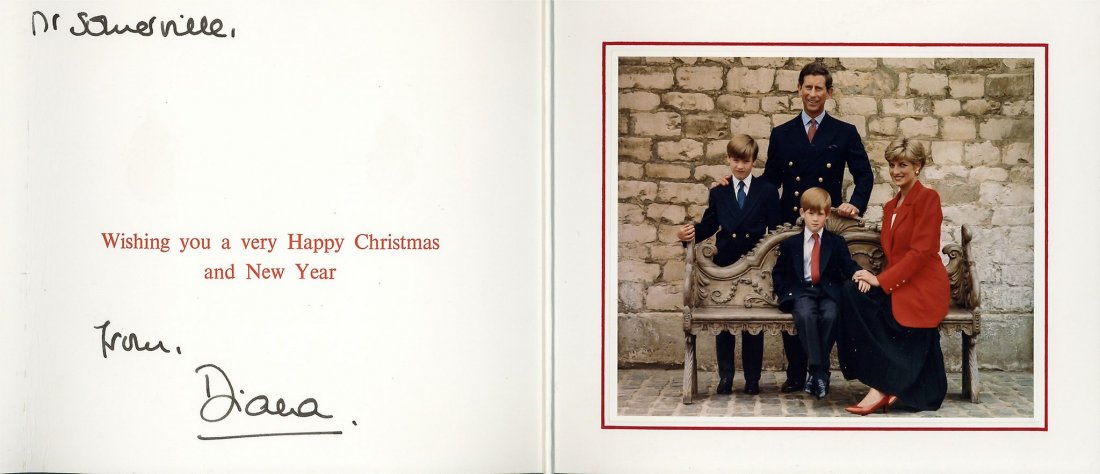 Royal Christmas card, undated, signed by Princess Diana: Royal Christmas card, undated, signed by Princess Diana ("Diana") to Mr. Somerville, mounted colour photograph of Charles and Diana with their two young sons, Princes William and Harry, white card mou