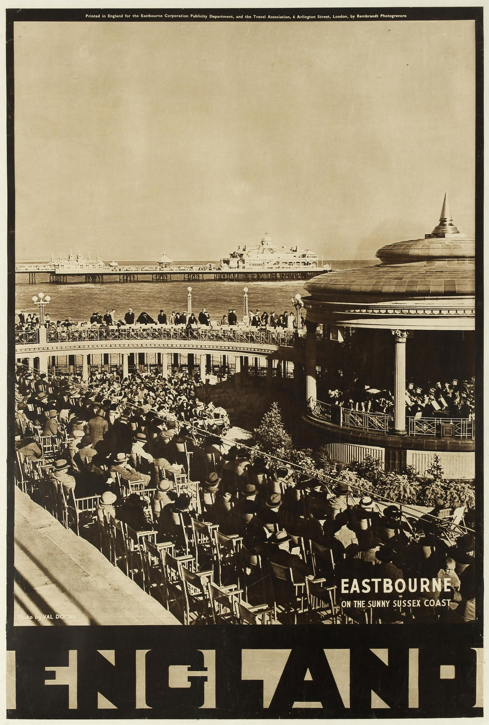 Travel Poster England Eastbourne Pier Val Doone: Original vintage travel poster published by the Travel Association to promote the seaside town of Eastbourne on the sunny Sussex south coast of England. This poster features a fantastic black and whit