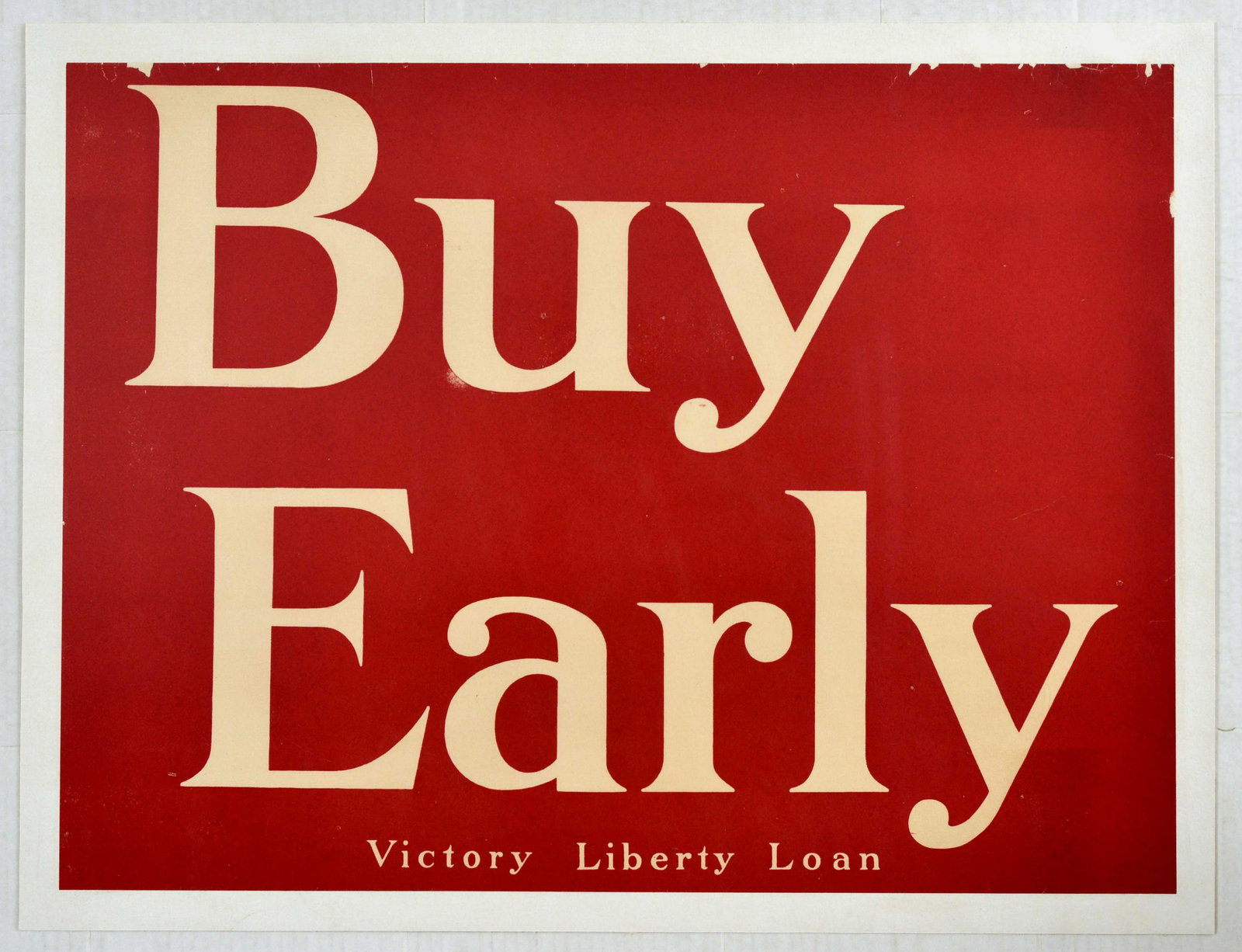War Poster Buy Early Victory Liberty Loan WWI USA: Original vintage World War One propaganda poster titled in bold text Buy Early - Victory Libert Loan, with white text against a red background. The text-only poster urges investment in the Victory Lib