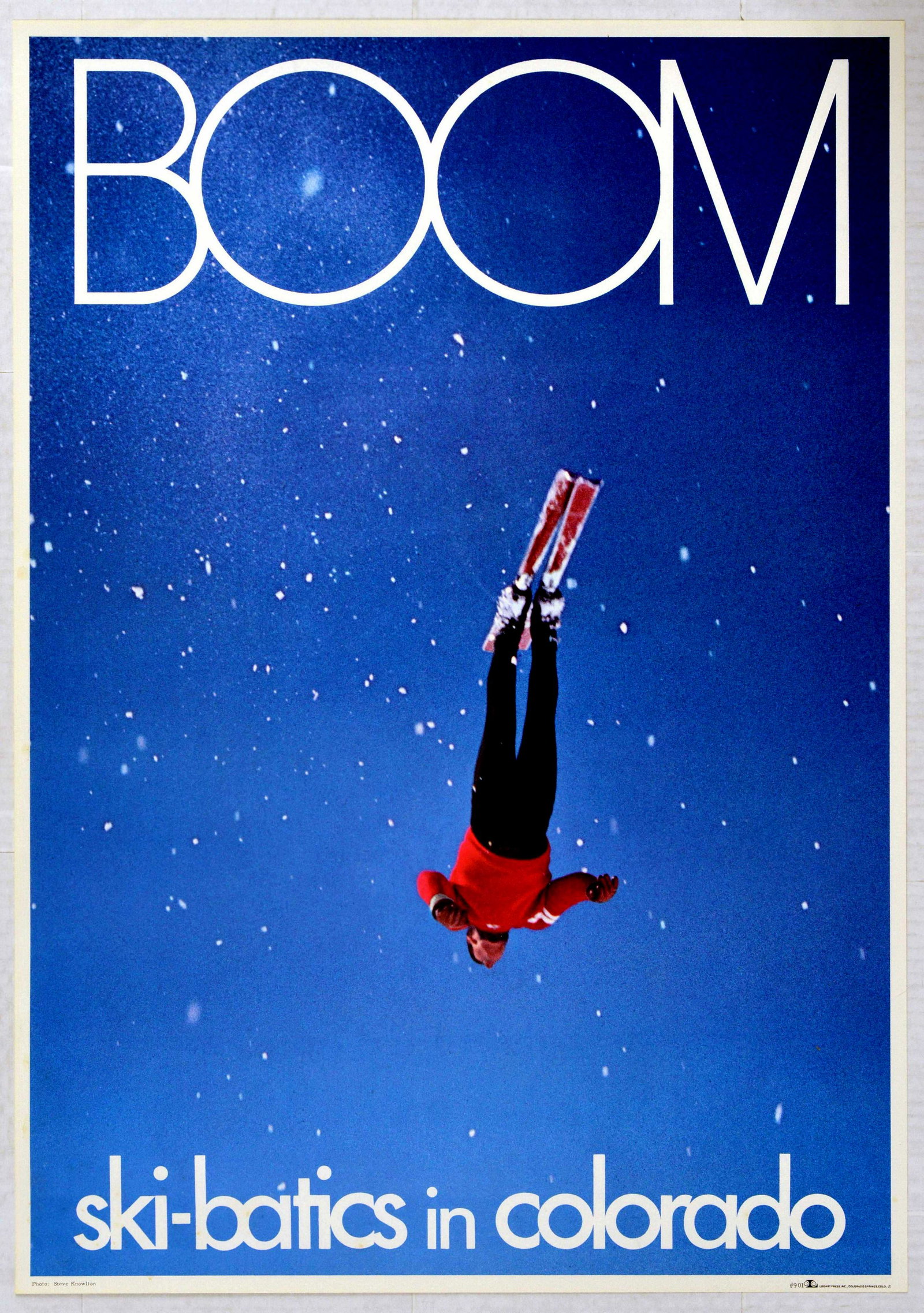 Sport Poster Boom Ski Batics Skiing Colorado USA: Original vintage ski poster Boom ski-batics in Colorado featuring a great image of a man ski jumping from a low angle with blue sky in the background. Excellent condition. Country of issue: USA, desig