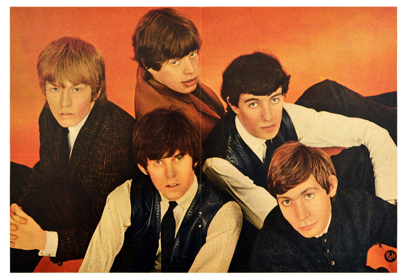 Advertising Poster Rolling Stones The Beatles Lennon: Original vintage poster of the Beatles issued by Fab magazine. The photograph shows the Beatles posing on an orange background early in their career. The reverse of the poster is a magazine page with 
