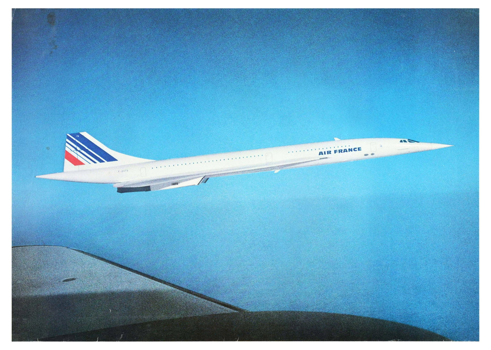 Travel Poster Air France Airline Concorde Window: Original vintage advertising poster for Air France featuring a picture of Concorde flying through a blue and pink sky with white clouds. Concorde was the British-French supersonic passenger airliner w