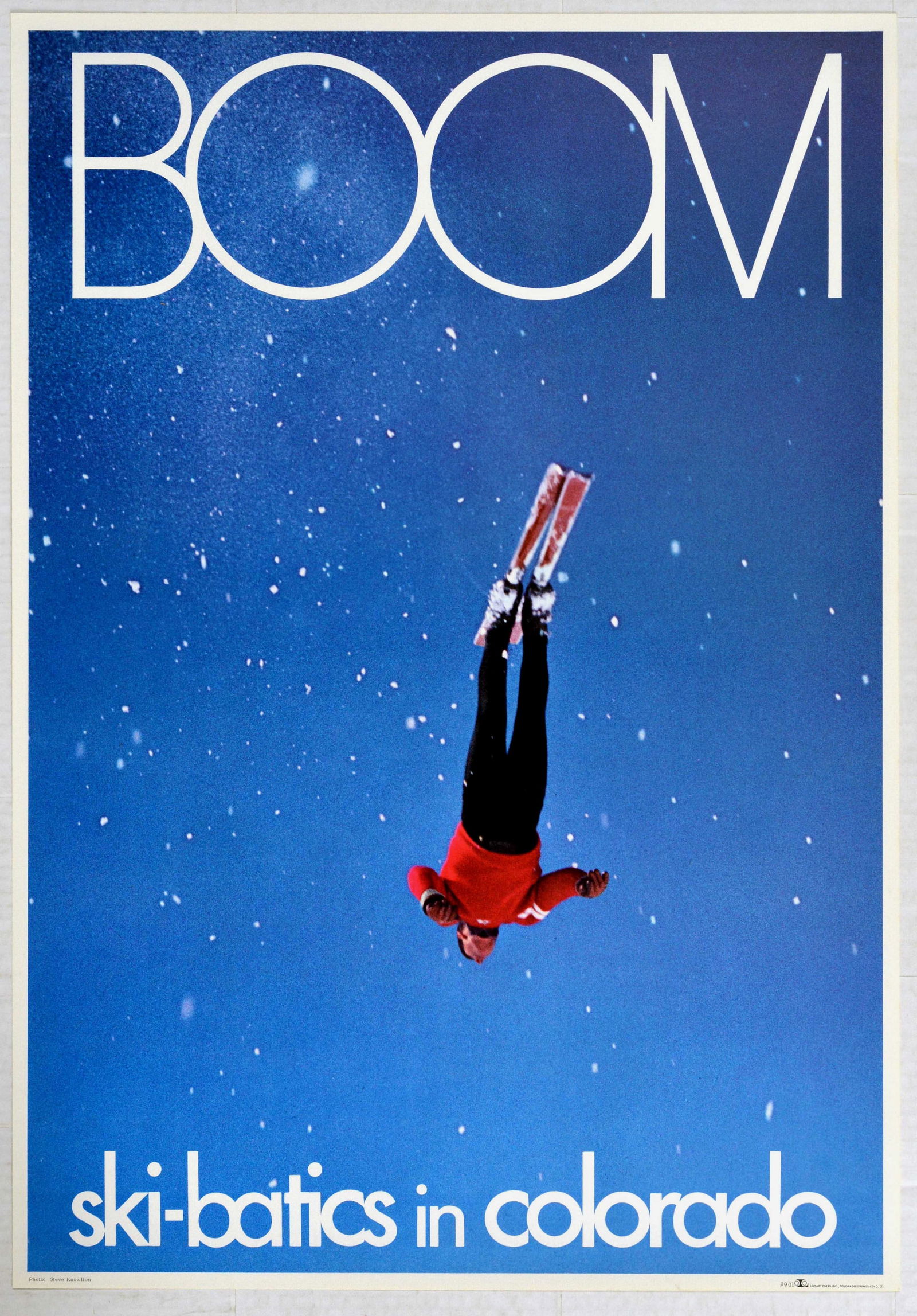 Sport Poster Boom Ski USA Aerial Skiing Colorado: Original vintage ski poster Boom ski-batics in Colorado featuring a great image of a man ski jumping from a low angle with blue sky in the background. Excellent condition. Country of issue: USA, desig