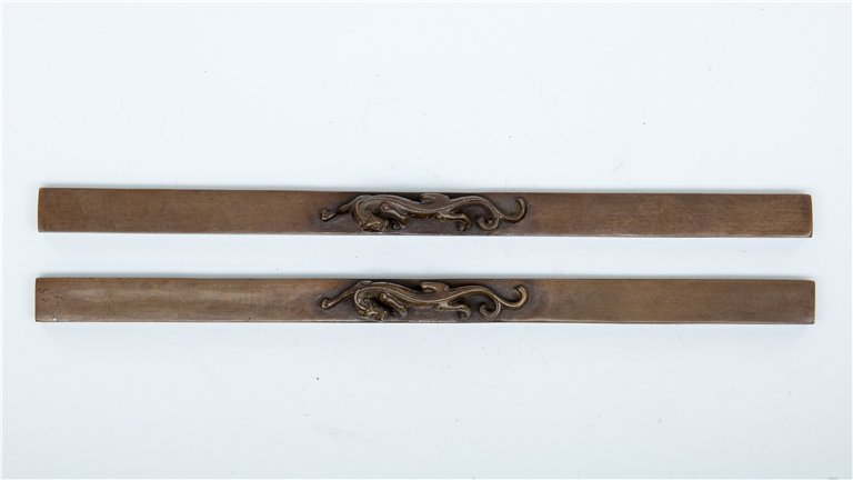 PAIR OF CHINESE BRONZE PAPER WEIGHTS: Pair of Chinese Bronze Paper Weights with Dragon Motif. Lg. 9 1/4 in.