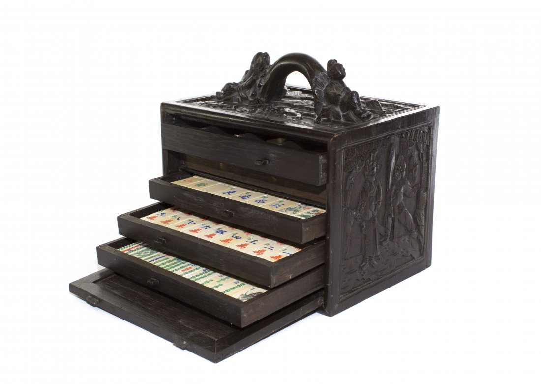 FULL SET OF MAHJNG IN ORIGINAL BOX: A full set of Chinese Mahjong in Original Box. Well carved rosewood box. L. 9 1/2 in. W. 7 in. H. 7 in.