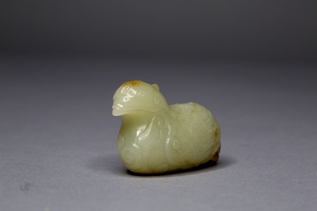 A CELADON JADE CARVING (1 of 5)