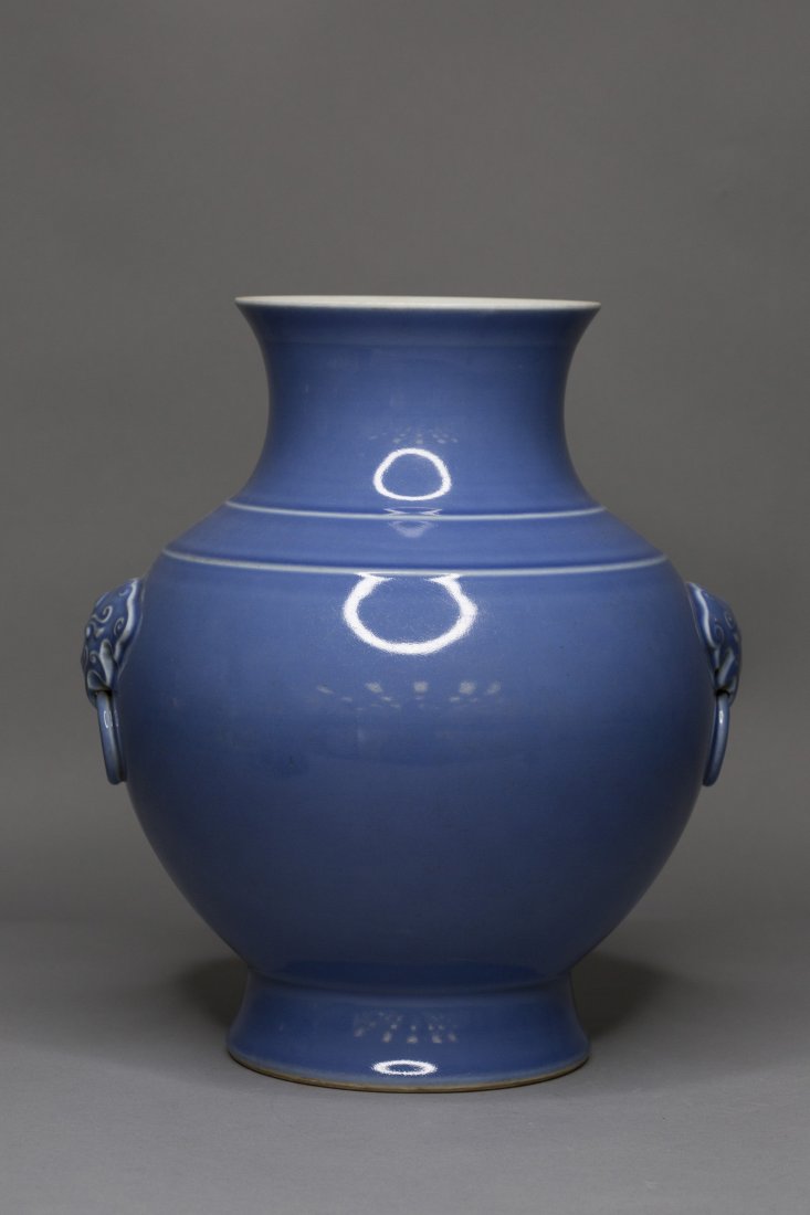 A BLUE GLAZED VASE WITH LOIN HEADS HANDLES (1 of 4)