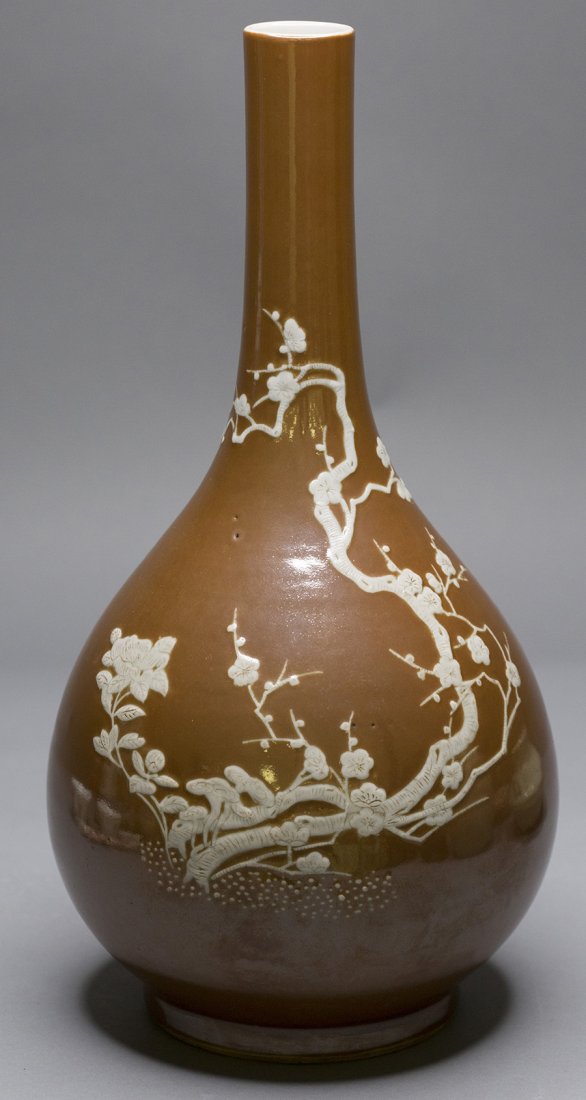 A BROWN GLAZED VASE (1 of 4)