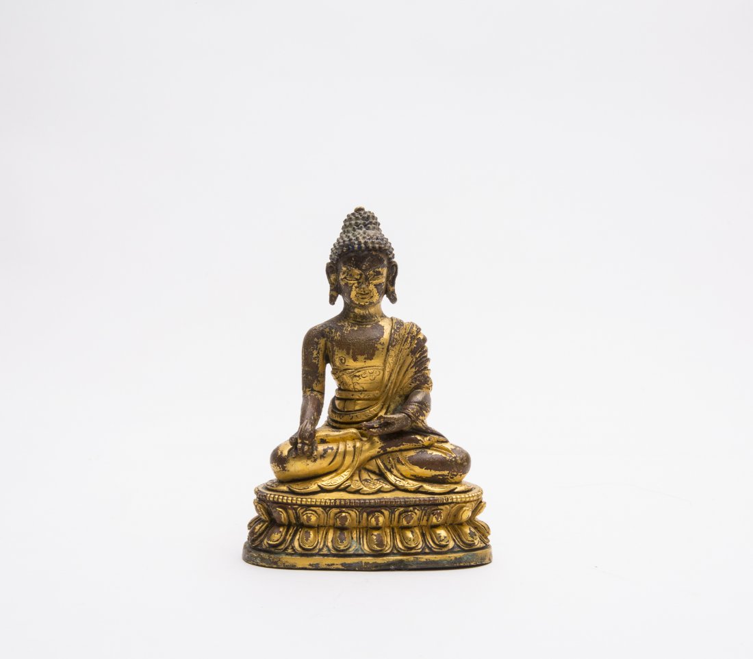 A GILT-BRONZE FIGURE OF SAKYAMUNI (1 of 4)