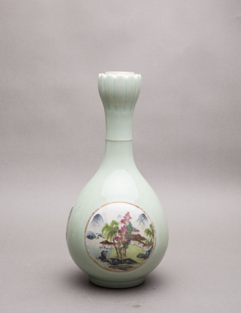 A CELADON AND FAMILLE-ROSE DECORATED VASE (1 of 5)